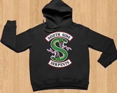 a black hoodie with the south side serpents on it and an image of a snake