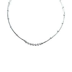 a silver necklace with beads on it