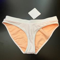 New With Tags White With Peach Lining. Small Discoloration On Lining (See Photo) Orange Stretch Swimwear For Workout, Orange Stretch Workout Swimwear, White Seamless Activewear For Summer, White Stretch Swimwear For Sports, Stretch White Swimwear For Sports, White Swimwear With Bra-friendly Design For Workout, White Workout Swimwear With Bra-friendly Design, White Bra-friendly Swimwear For Workout, White Seamless Sports Swimwear