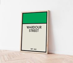 there is a poster on the wall in front of it that says wardour street