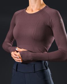 Lux Seamless LS (Long Sleeve): Breathable performance fabric offers the most comfortable ride. Moisture-wicking, UV protection technology keeps you cool and safe so you can do what you do best - Ride! Lux Seamless LS features include: Moisture Wicking Technology Breathable Fabric UV Protection Thumb Hole Fitted Functional Activewear For Outdoor, Fitted Technical Activewear For Outdoor Activities, Technical Fitted Activewear For Outdoor Activities, Fitted Top With Seamless Construction In Recycled Polyester, Fitted Seamless Top In Recycled Polyester, Fitted Solid Tops For Outdoor Activities, Seamless Fitted Tops In Recycled Polyester, High Stretch Outdoor Activewear With Thumbholes, High Stretch Activewear With Thumbholes For Outdoor