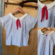 "Vintage 1930s cotton pinstripe top, beach pajama style. Sailor collar and bright red bow, one single button at the back for an open back look. The fabric is a heavy cotton, and the sleeve and hem are finished with seam tape.  Condition: excellent vintage condition. slight yellowing at armpits. Labels/tags: none Measurements: taken flat -bust from pit to pit 19\". best for a 32\" or smaller, bust is high. -sleeve length from center neck to hem 11.5\" -waist from seam to seam 15.75\" -overall length 19.5\" *To ensure a great fit, we recommend comparing the measurements above to a similar garment you own and love to wear, as sizing varies across the decades.  *If ordering more than one item, I will adjust shipping costs and refund the difference as shipping has been added into my pricing.  * Fitted Cotton Tops With Sailor Collar, Cotton Sailor Top With Sailor Collar, Beach Cotton Blouse With Collar, Collar Beach Blouse In Cotton, Retro Cotton Tops With Striped Collar, Pinstripe Cotton Blouse With Striped Collar, Cotton Pinstripe Blouse With Striped Collar, Vintage Cotton Top With Peter Pan Collar, Pinstripe Top For Summer Daywear