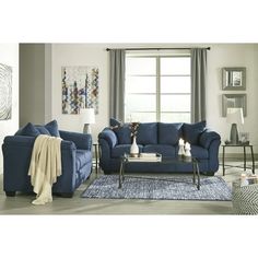 Introduce some contemporary-style comfort into your cozy living room with the Aruca Sensations Navy Blue Microfiber Pillow Back Living Room Collection. This striking sofa set sports a soft gray hue and plenty of plushness for complete sitting comfort. The sofa is built from selected solid hardwood with dense foam padding the frame. The armrests and pillow-back cushions are also stuffed with foam. Upholstering the sofa is a durable, dense microfiber. Subtle block feet support this fetching piece. Navy Blue Sofa Living Room Ideas, Navy Blue Couch Living Room, Navy Blue Couches, Blue Furniture Living Room, Blue Couch Living Room, Blue Sofas Living Room, Navy Blue Sofa, Blue And White Living Room, Blue Living Room Decor