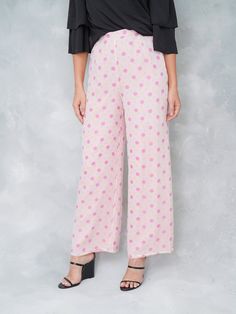 "Vintage 90s Pink Silk Pants - Wide leg design - High Waist - Zips up the Side -Measurements- Estimated Size: Small Bust: --- Waist : 26\" Hips: 38\" Length: 42\" Inseam: 29\" Model is 5'9 and measures 32/25/34" Polka Dot Wide Leg Pants With Elastic Waistband, Polka Dot Wide-leg Pants With Elastic Waistband, Chic Polka Dot Bottoms With Elastic Waistband, Polka Dot Wide Leg Bottoms With Pockets, Casual Wide Leg Polka Dot Pants, Casual Polka Dot Wide Leg Pants, Casual Wide-leg Polka Dot Pants, Summer Polka Dot Pants With Elastic Waistband, Polka Dot Wide Leg Summer Pants