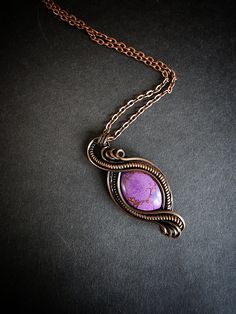 Handcrafted in Canada.  Wire wrap copper pendant with a purple turquoise stone. Comes with a 16-18 inch vegan leather chain. Each piece is a unique, one of a kind work of art lovingly made with care and consideration of the person that will ultimately possess it.  Copper is said to be an enhancing metal, strengthening the metaphysical properties of the stone that it encompasses.   It is said to amplify optimism, activate chakras, and balance energy.  Copper is considered to be a healing metal an Activate Chakras, Apollo God Of The Sun, Apollo God, God Of The Sun, Balance Energy, Purple Turquoise, Les Chakras, Copper Pendant, Wire Weaving