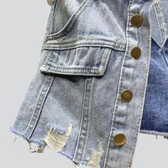 Introducing the 2023 Summer Collection's distressed hem buttoned denim skort. a grunge-inspired masterpiece perfect for the modern fashionista!Why You'll Fall In LoveThis skort is a unique combination of vintage-inspired grunge and urban flair. tailored to fit comfortably and stylishly. Its mid-waist rise. distressed hem. and buttoned closure all come together to create a timeless look that will take you from day to night with ease.Unmissable Highlights: Grunge-Inspired: Tap into the grungy vibe Fall Distressed Denim Jean Shorts, Chic Denim Jean Shorts For Fall, Chic Distressed Denim Jean Shorts, Fall Denim Cutoff Jean Shorts, Summer Denim Jacket With Frayed Hem And Button-up, Summer Denim Jacket With Frayed Hem, Trendy Denim Blue Jean Shorts For Fall, Trendy Blue Jean Shorts For Fall, Trendy Distressed Jean Shorts For Fall