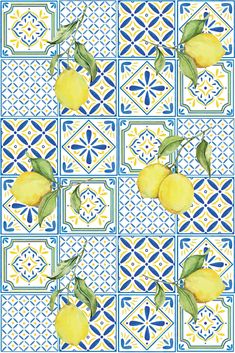 a blue and yellow tile pattern with lemons on the top, in front of it