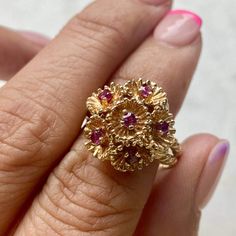 14k Yellow Gold Ruby Gemstone 6.8gm Size 7.5 Resize available under request Thank you for visiting our shop! Follow us on Instagram https://www.instagram.com/dmkjewelry_/ 𝑫𝑴𝑲 𝑱𝒆𝒘𝒆𝒍𝒓𝒚 Unique Gemstone Cluster Ring In Yellow Gold, Unique 14k Gold Jewelry With Center Stone, Luxury Yellow Gold Cluster Ring, Heirloom Ruby Cluster Jewelry, Fine Jewelry Ruby Cluster Ring Stamped 14k, Unique Red 14k Gold Jewelry, Unique 14k Gold Ruby Ring As Gift, Unique 14k Gold Ruby Ring For Anniversary, Gold Cluster Ruby Ring In 14k