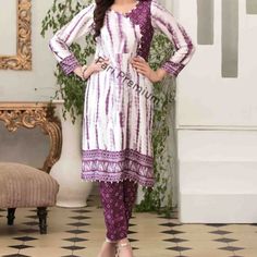 Brand New Stitched, Ready-Made, Embellished, Tie & Dye Printed, 2-Piece Silk Shalwar Kameez 2 Piece Suit Ready-Made / Stitched / Ready To Wear Two Piece Includes: 1. Shirt: Full-Sleeve Silk Fabric Kameez, Printed Tye & Dye Design On Front & Back Of Shirt With Pearls & Design Cut Neck, And Pearls On Front Shirt Daaman. 2. Shalwar: Silk Fabric Shalwar/Pant With Fully Printed Tie & Dye Shalwar Color(S): Grape-Purple, White Clothing Type(S): Kurti/Kameez, Shalwar/Trouser Available In Sizes: Medium 41 Bust/Chest (Us 14) Large 46 Bust/Chest (Us 20) Measurements: Medium 41" Size Shirt/Kameez: Bust-Round: 41.5" Waist-Round: 39.5" Hip-Round: 46" Length: 37" Medium S Fitted White Cambric Lawn Suit, White Fitted Unstitched Cambric Suit, Fitted Mulmul Salwar Kameez With Bandhani Print, Bandhani Print Salwar Kameez In Mulmul, Designer Fitted Purple Lawn Suit, Fitted Purple Designer Lawn Suit, White Cambric Palazzo Set For Eid, White Fitted Mulmul Lawn Suit, White Cambric Kurta