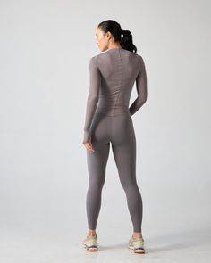 The silky smooth, breathable, and effortlessly sexy layer your warmup has been craving. Searching for a practical styling piece that instantly elevates any active outfit? Look no further. Wear the performance slip with a sports bra and leggings, or over a onesie to achieve that “dancer-core” aesthetic. Gray Compression Activewear With Built-in Bra, Gray Activewear With Built-in Bra And High Stretch, Sporty Workout Leggings With Built-in Bra, Gym Activewear With Built-in Bra And Minimal Stretch, Fitted Activewear With Built-in Bra For Pilates, Fitted Yoga Pants With Built-in Bra For Sports, Versatile High Stretch Moisture-wicking Activewear, Technical Activewear For Yoga, Versatile High-stretch Moisture-wicking Activewear