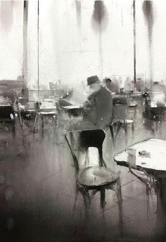 black and white photograph of people sitting at tables in the rain