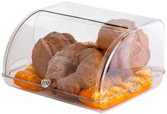 a clear plastic container filled with oranges and buns