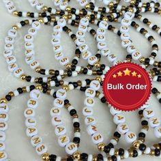 "BULK ORDERS You can make different designs for each bracelet. In bulk orders and special days, production and cargo delivery may take a long time. Therefore, it is better to order 15 days in advance. Bead Letter Colors Black W/Gold Letter/Gold filled White W/Silver Letter/Silver filled White W/Black Letter/Silver filled White W/Gold Letter/Gold filled White W/ Black Number  Ready to ship in 1 pcs -500 pcs 3-5 busıness days 600-2000 pcs 5-7 business days 2100-5000 pcs 7-10 business days These pe Customized White Wristband Bracelet, Customized White Bracelets As Gift, Customizable White Bracelet For Gifts, Customizable White Bracelet For Gift, Customizable Round Beads Wristband For Gift, Customizable Round Beads Wristband As Gift, Customized White Name Bracelet With Round Beads, Customized White Beads For Gifts, Customized White Bracelets With Round Beads