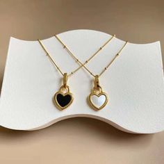 Heart-shaped Metal Necklace For Her, Metal Necklaces With Double Heart Charm, Heart Pendant Necklace With Adjustable Chain, Metal Double Heart Charm Necklaces, Metal Heart Pendant Necklace, Double Heart Charm Metal Necklace, Vintage Double Heart Jewelry, Heart-shaped Metal Charm Necklaces With Delicate Chain, Heart Charm Necklace With Round Pendant