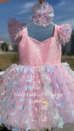 custom handmade dresses for your baby. Made with tulle. It is prepared with a soft cotton lining. It has a zipper on the back, very easy and comfortable to wear. 👉🏻 you can leave a message for more questions 👉🏻 It is a handmade dress that you can measure and customize. Very dense tulle layers are used, very fluffy, personalized color options are available, you can personalize ✈️Delivered to many countries within 1-5 days by express shipping 💝 Pink Fairy Dress With Ruffles, Butterfly Embroidered Party Dresses, Cute Butterfly Dresses For Spring, Butterfly-shaped Tulle Dress For Dress-up, Butterfly Shape Tulle Dress For Party, Party Dress With Ruffles And Butterfly Shape, Butterfly-shaped Tulle Dress For Party, Butterfly Shape Tulle Party Dress, Whimsical Pink Baptism Dress