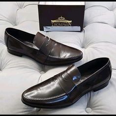 Original Model Thompson #E492 Brown Leather Penny Loafers Mens Dress Shoes Size 44 Eu Approximately 10 Us. Made In Italy. New In Box, No Lid Included. Elevate Your Style With These Original Model Thompson Abrasivato Penny Loafers, Perfect For Any Dressy Occasion. The Almond Toe Shape And Solid Brown Color Provide A Classic Look, While The Slip-On Closure And Stretch Feature Ensure Comfort And Convenience. These Shoes Are Suitable For Men Who Appreciate Quality And Style. The Outsole And Lining M Luxury Brown Double Breasted Suit With Notch Lapel, Luxury Classic Derby Shoes With Leather Footbed, Luxury Gentleman Moc Toe Leather Shoes, Luxury Slip-on Men's Shoes With Goodyear Welt, Luxury Leather Lined Derby Shoes For Business, Luxury Formal Leather Shoes With Leather Footbed, Luxury Brogue Loafers For Business, Luxury Leather Shoes For Business With Goodyear Welt, Luxury Gentleman Style Slip-on Leather Shoes