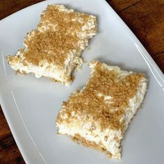 two pieces of cake sitting on top of a white plate