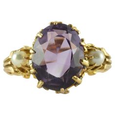 This antique Victorian oval-shaped amethyst center stone measuring 9.7 x 10.11mm is flanked by two 3mm seed pearls and set in 14kt yellow gold. Seed Pearl Ring, Seed Pearl, Pearl Ring, Antique Victorian, Pearl Jewelry, Jewelry Rings, Seeds, Jewelry Design, Amethyst