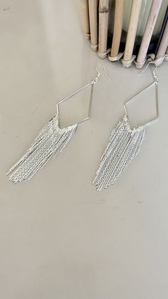 Silver tassel earrings.  With a geometric design and embellished with multi tassels.  Lightweight.  8cm long. Silver Tassel Earrings, 90s Glam, Disco Glam, Tassel Scarf, Metal Belt, Geometric Earrings, Pierced Earrings, Tassel Earrings, Earings Piercings