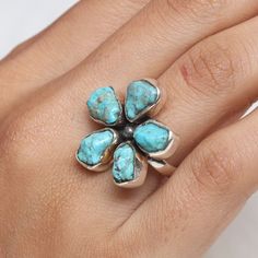 Raw Arizona Turquoise Ring, 925 Sterling Silver Ring, Floral Shaped Ring, Rough Gemstone Ring, December Birthstone, Handmade Silver Jewelry Gemstone Name - Arizona Turquoise Stone Quality - AAA  Weight - 8.87 gm  Length - 2.5 cm Width - 2.5 cm Stone Shape - As shown in the picture Ring Size - All Ring Size Available  We serve complete 925 sterling silver Jewelry and genuine properties of the stone.  The products are dispatched from the small business from UK. Product Quality and Packaging - Our Gift Turquoise Cluster Ring With Gemstone, Artisan Turquoise Ring With Natural Stones For Anniversary, Spiritual Turquoise Ring With Natural Stones For Anniversary, Artisan Turquoise Gemstone Ring For Anniversary, Turquoise Ring With Natural Stones, Unique Turquoise Ring With Natural Stones For Anniversary, Rough Gemstone Ring, Handmade Silver Jewelry, Arizona Turquoise