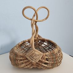 a wicker basket sitting on top of a table