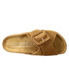 Women's sandals with double woven buckle

Brown suede

Cork and rubber sole

Padded insole

Made in Italy

Composition:
 Upper: 100% Suede
 Lining: 100% Leather
 Bottom: Cork and rubber
 Insole: 100% Leather Suede Footbed Sandals With Tang Buckle And Round Toe, Suede Slide Sandals With Buckle Closure, Brown Suede Slide Sandals, Suede Sandals With Tang Buckle And Round Toe, Brown Suede Double Strap Footbed Sandals, Suede Slides With Buckle Closure For Beach, Brown Suede Sandals With Tang Buckle, Suede Slides With Buckle Closure And Round Toe, Brown Suede Slides With Buckle Closure