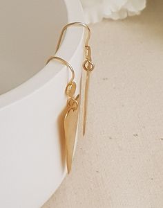 "18K Gold Plated Triangle dangle earrings, minimalist earring drop earrings, gold earrings, geometric earrings, unique gifts for women Lightweight and comfortable to wear these earrings are perfect sparkle for everyday! * They will make a great gift! * Total length of the earrings is 48 mm/ 1.9 \" approx from top to bottom. * Weight: 4 Grams * Material: 18k Gold Plated * The gold plating is a high quality 3 microns 18k gold thick * Pendants are Highet 31 mm, Width 15 mm * Ear wires are gold plat Modern 14k Gold Filled Teardrop Earrings, Modern Teardrop 14k Gold Filled Earrings, Modern 14k Gold-filled Teardrop Earrings, Simple 14k Gold Filled Drop Earrings, Modern 14k Gold Filled Linear Earrings Gift, Minimalist Gold Plated Teardrop Earrings As Gift, Minimalist Gold Plated Teardrop Earrings, Minimalist 14k Gold Filled Teardrop Dangle Earrings, Minimalist Gold Plated Earrings