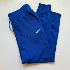 Never Worn! Nike Track Pants Blue, Blue Fitted Sweatpants For Sports, Fitted Blue Sweatpants For Sports, Blue Sportswear Pants For Loungewear, Fitted Athleisure Blue Sweatpants, Fitted Blue Sweatpants For Athleisure, Blue Fitted Athleisure Sweatpants, Casual Blue Nike Joggers, Fitted Blue Joggers With Pockets