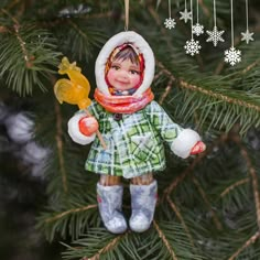 a christmas ornament hanging from a tree