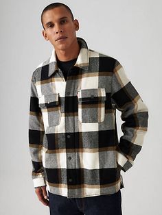 Indulge in timeless style and comfort with our cotton plaid shirt jacket, boasting a quilted interior lining for added warmth and coziness. With its thoughtful design featuring two lower on-seam hand pockets, two snap chest pockets, a center front zip closure with snap placket, and a laydown collar, this jacket is the perfect blend of fashion and functionality. Soft cotton plaid fabric offers a classic and versatile look suitable for various occasions. Quilted interior lining provides extra warmth and insulation, perfect for cooler weather. Two lower on-seam hand pockets offer convenient storage and hand-warming functionality. Two snap chest pockets add a stylish and functional element to the jacket's design. Center front zip closure with snap placket ensures a secure fit and adds a touch Plaid Cotton Outerwear With Buttoned Pockets, Plaid Shacket With Snap Buttons For Winter, Winter Plaid Shacket With Snap Buttons, Winter Flannel Outerwear With Snap Buttons, Classic Winter Flannel Outerwear, Classic Button-up Flannel Outerwear, Classic Collared Flannel Outerwear, Plaid Flannel Outerwear With Pockets, Classic Plaid Shacket For Winter