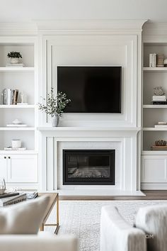 a living room filled with furniture and a flat screen tv mounted above a fire place