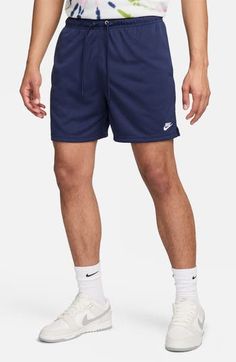 Relaxed and comfortable, these shorts made of breathable mesh sport handy pockets and a roomy fit that's perfect for working out, going out or just hanging out. 5 1/2" inseam; 26" leg opening; 12 1/2" front rise; 13 1/2" back rise (size medium) Lined Elastic/drawstring waist Side-seam pockets; back hook-and-loop patch pocket 100% polyester Machine wash, tumble dry Imported Leisure Athletic Shorts With Built-in Shorts, Nike Nylon Sports Shorts, Nike Nylon Shorts, Nike Moisture-wicking Nylon Shorts, Nike Sports Shorts With Side Pockets, Nike Athletic Shorts With Pockets, Nike Summer Activewear Shorts, Nike Activewear With Shorts For Summer, Nike Sporty Nylon Shorts