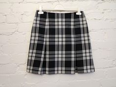 "Womens Black White Tartan Plaid Knee Skirts Low Waist Pleated Skirts Checkered Skirts Back to School Skirts Schoolgirl Skirts Small Size N.B. Color may slightly differ from picture. Label size: 36 Measurements (taken laying flat): Waist: 14.5\" / 37 cm Hips: 18.5'' / 47 cm  Length: 18\" / 45.5 cm Please check measurements to insure a proper fit. Remember to allow yourself some extra room for movement. You can compare these with something from your closet that fits you well. Condition: great Vintage Condition SHIPPING * I ship worldwide via Priority mail. * I ship from Europe, so please allow 2 to 4 weeks for the package to arrive if you live overseas. * Europe 5 - 10 business days." School Skirts, School Skirt, Checkered Skirt, Knee Skirts, Black And White Skirt, Pleated Skirts, Extra Room, Tartan Plaid, Low Waist