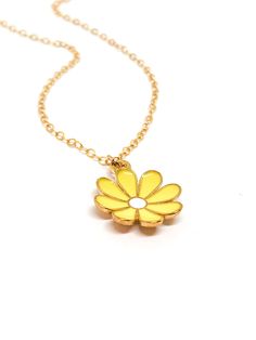 Handmade in Portland, Oregon. Celebrating Spring with this pretty flower necklace (available in several other colors as well!) MEASUREMENTS + MATERIALS - Length is about 16 inches and is adjustable. - Made with a gold fill chain for longevity and sensitive skin - Pretty yellow flower charm is gold plated WHAT PEOPLE SAY “Beautiful craftsmanship, these were for my mother in law, she loves them. I love supporting small businesses.” - Josh “Love these earrings!! I get so many compliments about them Adjustable Delicate Chain Necklace With Flower Pendant, Adjustable Flower Pendant Necklace With Delicate Chain, Dainty Yellow Flower Shaped Jewelry, Dainty Adjustable Flower Necklace, Delicate Flower Pendant Necklace Adjustable, Adjustable Birth Flower Necklaces, Delicate Adjustable Necklace With Flower Pendant, Delicate Adjustable Necklace With Flower Charm, Yellow Adjustable Flower Pendant Necklace