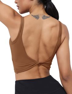 PRICES MAY VARY. VERSATILE MATERIAL: LUYAA women's sports bra made of a soft performance fabric with moisture wicking, 4-way stretch and breathable , this tank will keep you comfortable throughout. WORKOUT SPORTS BRA WITH PADDING:The backless bra is great for yoga ,weight lifting or other exercise because of the low-medium support. Twist low back highlight your back muscles. OPEN BACK CROP TANK TOP:Built-in bra tanks with multi-purpose designe.You can often wear our crop tops straight from your Cute Sports Bra, Yoga Crop Tops, Cami Bra, Womens Workout, Bottom Workout, Workout Tops For Women, Gym Tank Tops, Yoga Tank, Workout Crop Top