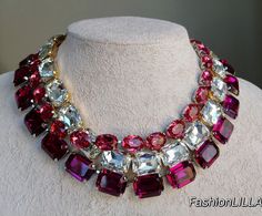 anna wintour necklace, Austrian crystal collet, fuchsia large octagon Georgian Paste riviere, rose pink oval necklace, statement necklace This group of individual necklaces are truly a la Anna Wintour style. clear ,fuchsia large octagon and rose pink oval crystals make them a true statement combination.  You can wear them individually all together, mix and match to accentuate your wardrobe. They can be ordered at a variety of lengths to create a unique combination every time you wear them.    Yo Anna Wintour Style, Large Pearl Necklace, Rhinestone Costumes, Oval Necklace, Crystal Necklaces, Anna Wintour, White Necklace, Necklace Statement, Austrian Crystal