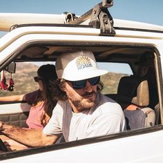 This is adventure-ready snapback from Roark passes the vibe check. White Trucker Hat For Travel, White Snapback Baseball Cap For Travel, White Snapback Hat For Travel, White Casual Snapback Hat For Travel, Summer Travel Snapback Hat With Flat Bill, Trucker Snapback Baseball Cap For Travel, Summer Trucker Hat With Flat Bill For Travel, Casual Trucker Hat With Flat Bill For Adventure, Casual Trucker Hat With Flat Brim For Adventure