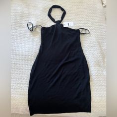 Super Soft And Stretchy Mini Dress, Would Fit A M/L Or A S But A Bit Oversized. Black Bodycon Halter Sleeveless Dress, Casual Black Halter Backless Dress, Casual Black Backless Halter Dress, Casual Black Halter Neck Dress, Black Stretch Halter Dress For Summer, Summer Black Stretch Halter Dress, Black Stretch Halter Dress Backless, Black Stretch Backless Halter Dress, Black Stretch Halter Backless Dress