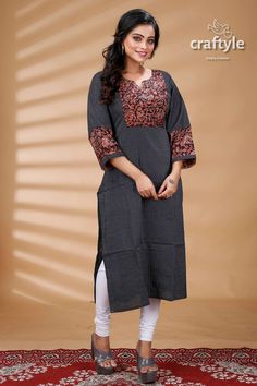 Presenting an exclusive women's kurti with hand embroidered kantha work. The unique multi-thread kantha embroidery design is entirely handcrafted on pure cotton by our skilled artisans. This beautiful Indian attire is suitable for any occasions and it will give you elegant ethnic look with ultimate comfort.  Sleeve Length : Long Sleeves Design : Hand Kantha Stitch Fabric : 100% Cotton Wash : Dry Clean  Get this exclusive Women's Cotton Kurti online at Craftyle - The best store for online shoppin Semi-stitched Cotton Kurta With Block Print, Semi-stitched Embroidered Cotton Fabric With Printed Motifs, Traditional Block Print Cotton Kurta, Semi-stitched Cotton Kurta With Printed Motifs, Traditional Cotton Tunic Wear, Traditional Cotton Tunic, Semi-stitched Kalamkari Traditional Cotton Wear, Semi-stitched Cotton Traditional Wear With Kalamkari Print, Cotton Kurta With Resham Embroidery