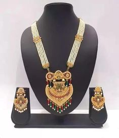 Create A Buzz Around Your Corner By Wearing This Necklace Set, You Will Always Be The Center Of Attraction Of Any Gathering By Wearing This Jewelry. The Kundan Stones elevate this piece to a collector item in every jewelry collection. Team it with a kurta or a sari and you are sure to stand out and receive many compliments. The Perfect Gift : Ideal for the Woman who loves products that are Handmade In India and artisanal. All occasion jewelry for through out the year from Valentines Day ,a Special Birthday or an Anniversary gift for your special one. CARE INSTRUCTIONS  Keep it away from perfumes, sprays & Water. It Is Advisable To Store Jewelry In A Zip Lock Pouch (Air Tight Pouch), Keep Away From Water Perfume And Other Chemicals And Clean It With Dry And Soft Cloth Traditional Festive Jewelry With Latkans, White Kundan Jewelry For Traditional Ceremonies, Handmade Jewelry For Traditional Ceremonies And Festivals, Traditional Necklaces For Festivals And Ceremonies, Elegant Heavy Necklaces For Traditional Ceremonies, Traditional Jewelry With Intricate Design For Ceremonies, Elegant Kundan Jewelry For Traditional Ceremonies, Traditional Jewelry Sets With Latkans For Diwali, Traditional White Jewelry For Festivals