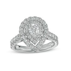 Tell her how much she means to you with this thrilling diamond engagement ring. Crafted in 14K white gold, this design showcases a 1/2 ct. pear-shaped diamond sparkling in a double diamond-lined frame. The shank glistens with diamonds to complete her look. Radiant with 1-1/2 cts. t.w. of diamonds and a bright polished shine, this engagement ring suits her glamorous style. Proposal Ring With Pear-shaped Brilliant Cut, Diamond White Pear-shaped Wedding Ring, Diamond White Pear-shaped Ring With Brilliant Cut, Pear-shaped Vvs Clarity White Wedding Ring, Pear-cut Diamond Ring For Formal Occasions, Diamond White Pear-shaped Diamond Cut Jewelry, Pear-shaped Diamond White Ring With Brilliant Cut, White Pear-shaped Vvs Clarity Wedding Ring, Brilliant Cut Pear-shaped Proposal Ring