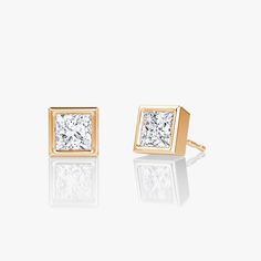 The Bezel Solitaire Studs combine vintage-inspired detail and modern appeal together for a look that’s timelessly elegant. Classic White Gold Earrings With Timeless Design, Classic White Gold Earrings, Classic Diamond Earrings With Polished Finish For Formal Events, Classic Diamond Earrings With Polished Finish For Formal Occasions, Classic Formal Diamond Earrings With Polished Finish, Formal 14k Gold Earrings With Timeless Design, 14k Gold Earrings For Anniversary With Timeless Design, Luxury Yellow Gold Earrings With Bezel Setting, Formal Fine Jewelry Diamond Earrings With Timeless Design