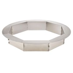 a white metal bracelet on a white background