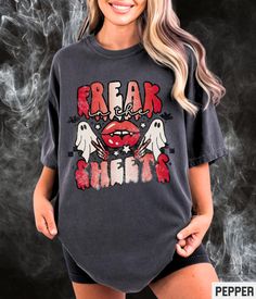 You're gonna love this super cute Freak In The Sheets retro Halloween T Shirt. Show off your spooky season aesthetic in this soft and trendy tshirt! Find more Fall shirts and cute accessories at Starrie Apparel. 👻 🎃 ✩ 𝗔𝗱𝘂𝗹𝘁 𝗕𝗲𝗹𝗹𝗮 𝗖𝗮𝗻𝘃𝗮𝘀 𝗧𝗲𝗲: https://starrieapparel.etsy.com/listing/1417894766 ✩ 𝗔𝗱𝘂𝗹𝘁 𝗖𝗼𝗺𝗳𝗼𝗿𝘁 𝗖𝗼𝗹𝗼𝗿𝘀 𝗧𝗲𝗲: ✩ 𝗔𝗱𝘂𝗹𝘁 𝗚𝗶𝗹𝗱𝗮𝗻 𝗦𝘄𝗲𝗮𝘁𝘀𝗵𝗶𝗿𝘁: Comfort Colors Halloween Shirt, Freak In The Sheets Funny Halloween Tshirt Cute Ghost Retro Graphic Tee Cute Spooky Womens Plus Size T-shirt SIZE UP for an OVERSIZED FIT (see size chart in listing photos). ✩ Our shop uses direct-to-garment printing to make our products. The design ink is sprayed on, then allowed to soak into the fibers of the garment. This process yields fine quality pr Spooky Shirt Designs, Grunge T-shirt For Fall Fan Merchandise, Retro Halloween T-shirt With Character Print, Retro Fan Merchandise Tops For Fall, Retro Fall Tops For Fan Merchandise, Vintage Halloween T-shirt With Letter Print, Spooky Graphic Print T-shirt For Fans, Trendy Halloween Graphic T-shirt, Vintage Crew Neck Halloween Tops