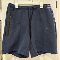 Elevate Your Activewear Game With These Nike Men's Tech Fleece Shorts. These Shorts Are Perfect For Any Occasion, Whether You're Going For A Walk, Hitting The Gym, Or Just Running Errands. The Drawstring Closure Ensures A Comfortable Fit, While The Compression Area Around The Waist Provides Added Support. Made With A Solid Blue Fleece Fabric, These Shorts Are Machine Washable For Easy Care. They Come In An Xl Size And Are Designed With An Athletic Fit. The Nike Tech Fleece Product Line Promises Navy Blue Nike Tech Fleece, Navy Nike Tech Fleece, Going For A Walk, Nike Tech Fleece, Nike Tech, Tech Fleece, Fleece Shorts, Shorts Athletic, Athletic Fits