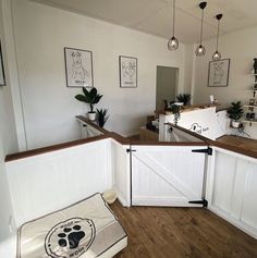 a dog bed in the corner of a kitchen