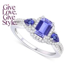 an engagement ring with three stones on it and the words give love, give style