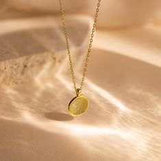 Capture cherished moments with our Fingerprint Coin Necklace, delicately shaped in a circle. Each necklace comes with a pressed circle charm, engraved with an actual fingerprint design, serving as a heartfelt tribute to love and connection. A thoughtful choice for Mother's Day, this necklace embodies the enduring beauty of maternal love, offering a timeless and meaningful gift for the special woman in your life. SKU: MM-NM144NI Product Details Material: High Quality Solid 925 Sterling Silver Fin Fingerprint Design, Mum Necklace, Fingerprint Necklace, Love And Connection, Station Necklace, Coin Necklace, A Circle, Circle Pendant, Rose Gold Necklace