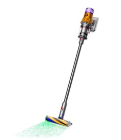 a close up of a vacuum cleaner on a white background with green and yellow dust