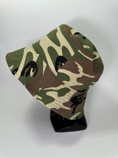 Fashionable wear for every weather. Custom made  bucket hat. Casual Wide Brim Bucket Hat For Outdoor, Khaki Cotton Bucket Hat For The Beach, Casual Brimmed Bucket Hat For Outdoor, Trendy Reversible Outdoor Hats, Casual Reversible Hat With Curved Brim, Reversible Cotton Bucket Hat For Outdoor, Khaki Cotton Bucket Hat With Short Brim, Trendy Cotton Bucket Hat For Winter, Casual Camouflage Hat For Beach